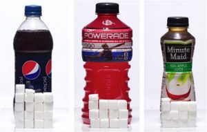 sugary drinks with cubes of sugar representing the amount of sugar in each serving